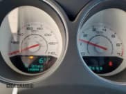 ✅ 2012 Dodge Challenger SXT • VIN: 2C3CDYAG6CH243537 • Lot: 73700494. Wystawiony na Copart z przebiegiem 143 844 mil. Bezpłatny archiwum sprzedaży aukcyjnych z USA i szczegółowy raport historii pojazdu na DreamBid. Zdjęcie 9.