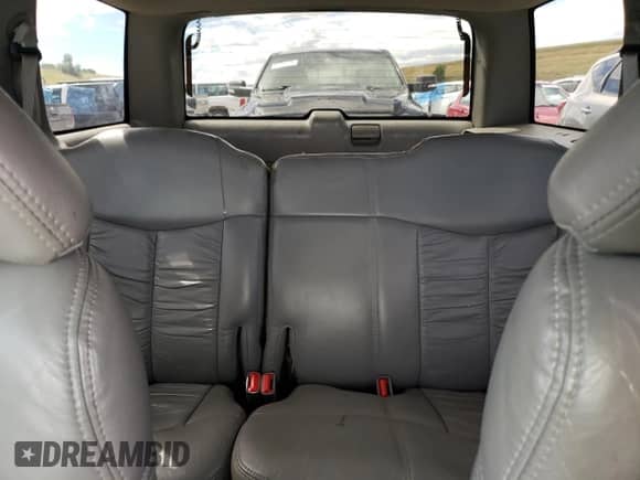 1996 Chevrolet Blazer z VIN 1GNDT13W4T2295876, wystawiony jako Copart lot #68904304 z przebiegiem 155 579 mil mil oraz Szkoda całkowita • Salvage title. Historia ofert i sprzedaży dostępna na DreamBid. Obrazek 10.