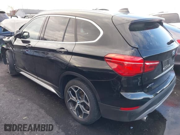 ✅ 2018 BMW X1 xDrive28i • VIN: WBXHT3C32J5L30876 • Lot: 43601112. Listed on IAAI with 27,972 mi. Free auction sales archive from the USA and detailed vehicle history report at DreamBid. Image 3.
