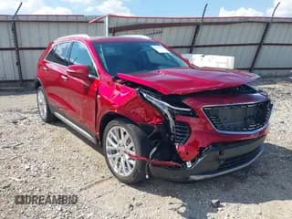 ✅ 2022 Cadillac XT4 AWD Premium Luxury • VIN: 1GYFZDR49NF142231 • Лот: 43358654. Опубликован ранее на IAAI с пробегом 23 965 миль. Бесплатный доступ к архиву аукционных продаж из США и подробный отчёт об истории автомобиля на DreamBid. Изображение 1.