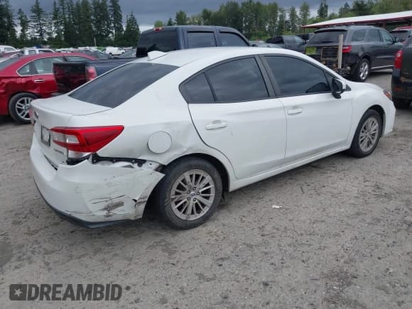 ✅ 2018 Subaru Impreza Premium • VIN: 4S3GKAD69J3622819 • Lot: 42934916. Listed on IAAI with 100,827 mi. Free auction sales archive from the USA and detailed vehicle history report at DreamBid. Image 4.