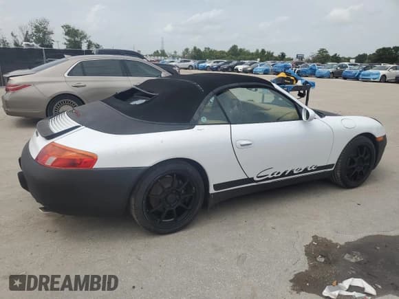 ✅ 1999 Porsche 911 • VIN: WP0CA2993XS651127 • Lot: 59631795. Listed on Copart with 99,103 mi. Free auction sales archive from the USA and detailed vehicle history report at DreamBid. Image 3.