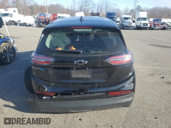 ✅ 2023 Chevrolet Bolt EV 2LT • VIN: 1G1FX6S0XP4175924 • Lot: 85198434. Wystawiony na Copart z przebiegiem 51 915 mil. Bezpłatny archiwum sprzedaży aukcyjnych z USA i szczegółowy raport historii pojazdu na DreamBid. Zdjęcie 6.