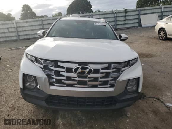 2022 Hyundai Santa Cruz SEL с VIN 5NTJC4AE3NH017822, выставлен на аукционе Copart как лот 81253684 с пробегом 25 955 миль миль и На запчасти • Non repairable. История ставок и продаж доступна на DreamBid. Изображение 5.