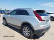 ✅ 2021 Cadillac XT4 FWD Premium Luxury • VIN: 1GYFZCR43MF084707 • Лот: 42883874. Опубликован ранее на IAAI с пробегом 54 356 миль. Бесплатный доступ к архиву аукционных продаж из США и подробный отчёт об истории автомобиля на DreamBid. Изображение 3.
