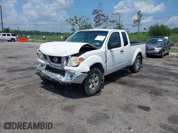 ✅ 2011 Nissan Frontier SV • VIN: 1N6AD0CW5BC422580 • Lot: 43053114. Listed on IAAI with 140,087 mi. Free auction sales archive from the USA and detailed vehicle history report at DreamBid. Image 2.