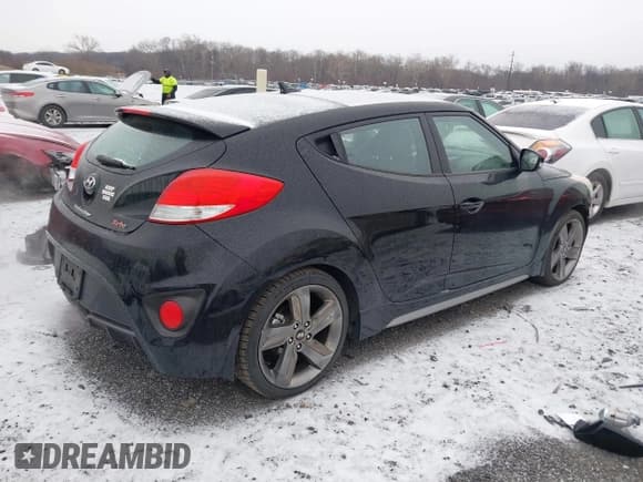 ✅ 2014 Hyundai Veloster Turbo • VIN: KMHTC6AE7EU207871 • Lot: 41174004. Wystawiony na IAAI z przebiegiem 130 347 mil. Bezpłatny archiwum sprzedaży aukcyjnych z USA i szczegółowy raport historii pojazdu na DreamBid. Zdjęcie 4.