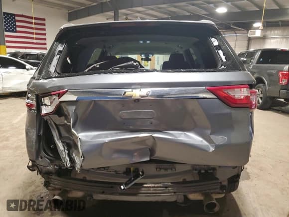 ✅ 2020 Chevrolet Traverse LS • VIN: 1GNERFKWXLJ303518 • Lot: 90496695. Wystawiony na Copart z przebiegiem 92 771 mil. Bezpłatny archiwum sprzedaży aukcyjnych z USA i szczegółowy raport historii pojazdu na DreamBid. Zdjęcie 6.