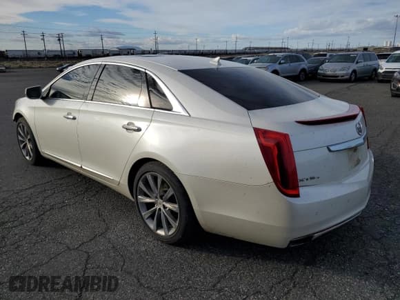 ✅ 2013 Cadillac XTS Luxury • VIN: 2G61R5S31D9215402 • Lot: 91679205. Wystawiony na Copart z przebiegiem 179 448 mil. Bezpłatny archiwum sprzedaży aukcyjnych z USA i szczegółowy raport historii pojazdu na DreamBid. Zdjęcie 2.