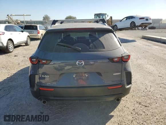✅ 2024 Mazda CX-50 S Preferred • VIN: 7MMVABBM3RN243266 • Лот: 86439985. Опубликован ранее на Copart с пробегом 27 899 миль. Бесплатный доступ к архиву аукционных продаж из США и подробный отчёт об истории автомобиля на DreamBid. Изображение 6.
