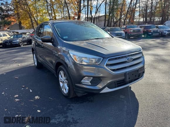 ✅ 2017 Ford Escape SE • VIN: 1FMCU9GD0HUD02497 • Lot: 93264155. Listed on Copart with 124,678 mi. Free auction sales archive from the USA and detailed vehicle history report at DreamBid. Image 4.