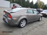 ✅ 2012 Chevrolet Malibu 1LS • VIN: 1G1ZB5E09CF150285 • Lot: 86843625. Listed on Copart with 129,115 mi. Free auction sales archive from the USA and detailed vehicle history report at DreamBid. Image 3.