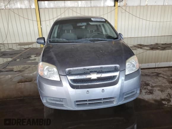 ✅ 2007 Chevrolet Aveo LS • VIN: KL1TD56647B111103 • Lot: 44649585. Wystawiony na Copart z przebiegiem 97 900 mil. Bezpłatny archiwum sprzedaży aukcyjnych z USA i szczegółowy raport historii pojazdu na DreamBid. Zdjęcie 5.