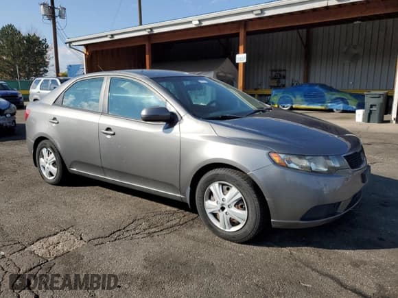 ✅ 2012 Kia Forte EX • VIN: KNAFU4A28C5618810 • Лот: 87033365. Опубликован ранее на Copart с пробегом 128 258 миль. Бесплатный доступ к архиву аукционных продаж из США и подробный отчёт об истории автомобиля на DreamBid. Изображение 4.