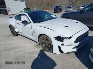 ✅ 2021 Ford Mustang GT • VIN: 1FA6P8CFXM5116342 • Lot: 41624402. Listed on IAAI with 36,474 mi. Free auction sales archive from the USA and detailed vehicle history report at DreamBid. Image 1.