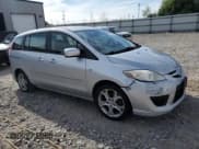 ✅ 2009 Mazda 5 Sport • VIN: JM1CR293990357282 • Lot: 71061185. Listed on Copart with Not provided. Free auction sales archive from the USA and detailed vehicle history report at DreamBid. Image 4.