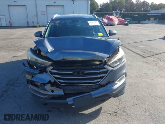 2016 Hyundai Tucson SE with VIN KM8J3CA48GU053428, listed as a IAAI auction lot 43407227 with 121,790 mi miles and . Bid and sale history available at DreamBid. Image 12.