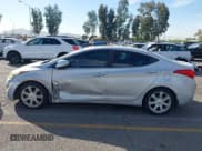 ✅ 2013 Hyundai Elantra GLS • VIN: KMHDH4AE5DU918428 • Lot: 43577973. Listed on IAAI with 116,708 mi. Free auction sales archive from the USA and detailed vehicle history report at DreamBid. Image 14.