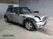 2010 MINI Hardtop with VIN WMWMF3C50ATZ66791, listed as a Copart auction lot 57592875 with Not provided miles and Salvage title. Bid and sale history available at DreamBid. Image 4.