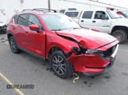 ✅ 2018 Mazda CX-5 Touring • VIN: JM3KFBCM2J0466233 • Lot: 43220530. Listed on IAAI with 109,259 mi. Free auction sales archive from the USA and detailed vehicle history report at DreamBid. Image 1.