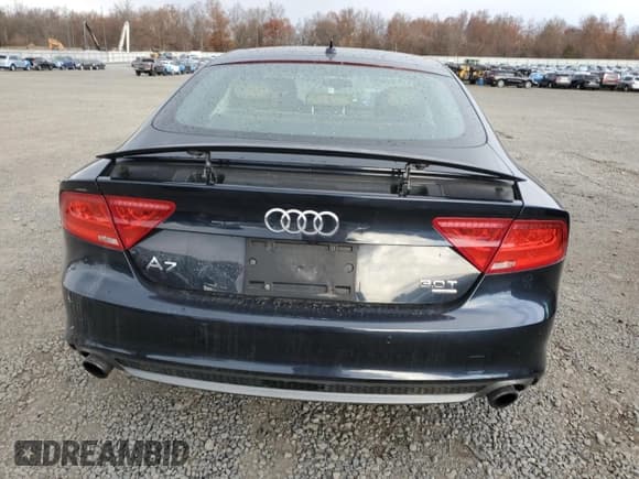 ✅ 2014 Audi A7 Prestige • VIN: WAU2GAFC0EN137409 • Лот: 92718625. Опубликован ранее на Copart с пробегом 126 941 миль. Бесплатный доступ к архиву аукционных продаж из США и подробный отчёт об истории автомобиля на DreamBid. Изображение 6.