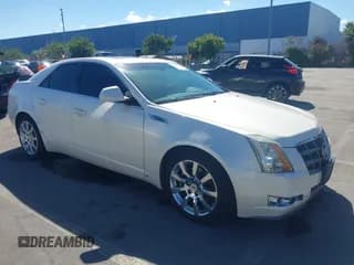 ✅ 2009 Cadillac CTS RWD • VIN: 1G6DV57VX90150733 • Lot: 43426220. Listed on IAAI with 155,085 mi. Free auction sales archive from the USA and detailed vehicle history report at DreamBid. Image 1.