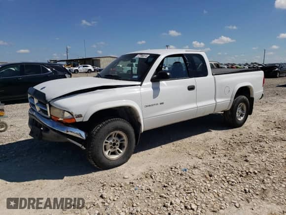 2000 Dodge Dakota Sport z VIN 1B7GG22N3YS509210, wystawiony jako Copart lot #72186814 z przebiegiem 231 730 mil mil oraz Szkoda całkowita • Salvage title. Historia ofert i sprzedaży dostępna na DreamBid. Obrazek 1.