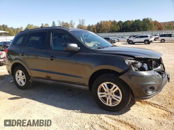 2011 Hyundai Santa Fe GLS с VIN 5XYZGDAB6BG069735, выставлен на аукционе Copart как лот 77184514 с пробегом 239 093 миль миль и Чистый • Clean title. История ставок и продаж доступна на DreamBid. Изображение 4.