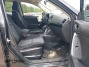 ✅ 2014 Mazda CX-5 Sport • VIN: JM3KE2BE5E0350057 • Lot: 42145910. Listed on IAAI with 157,517 mi. Free auction sales archive from the USA and detailed vehicle history report at DreamBid. Image 5.