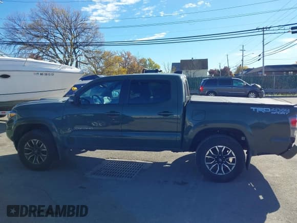 ✅ 2021 Toyota Tacoma SR • VIN: 3TYCZ5AN2MT023832 • Lot: 43542339. Listed on IAAI with 80,341 mi. Free auction sales archive from the USA and detailed vehicle history report at DreamBid. Image 14.