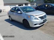 ✅ 2014 Nissan Versa SV • VIN: 3N1CN7AP5EL849010 • Lot: 43141216. Listed on IAAI with 133,732 mi. Free auction sales archive from the USA and detailed vehicle history report at DreamBid. Image 1.