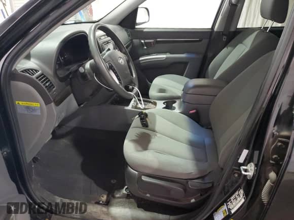 2012 Hyundai Santa Fe GLS z VIN 5XYZGDAB0CG115738, wystawiony jako Copart lot #62925954 z przebiegiem 121 078 mil mil oraz Szkoda całkowita • Salvage title. Historia ofert i sprzedaży dostępna na DreamBid. Obrazek 7.