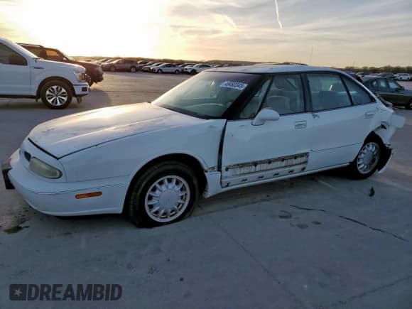 ✅ 1997 Oldsmobile 88 LS • VIN: 1G3HN52K1V4861185 • Лот: 49493345. Опубликован ранее на Copart с пробегом 167 267 миль. Бесплатный доступ к архиву аукционных продаж из США и подробный отчёт об истории автомобиля на DreamBid. Изображение 1.