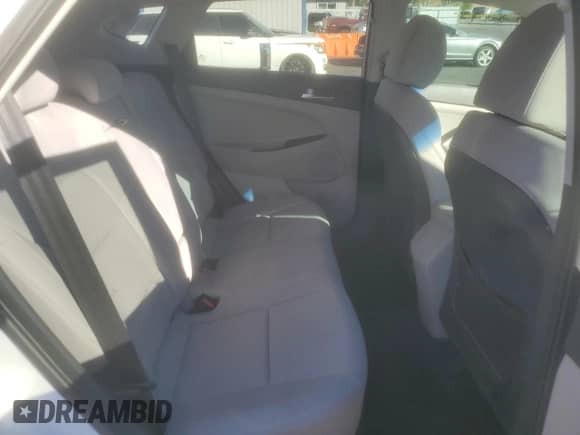 2019 Hyundai Tucson SE с VIN KM8J23A43KU975620, выставлен на аукционе Copart как лот 90310345 с пробегом 88 902 миль миль и Списание • Salvage title. История ставок и продаж доступна на DreamBid. Изображение 11.