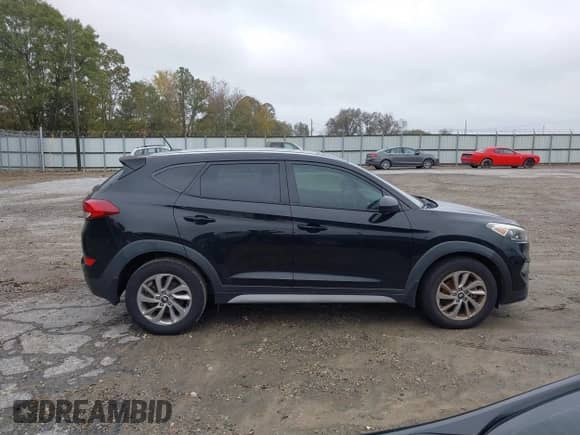 2017 Hyundai Tucson SE z VIN KM8J33A42HU585775, wystawiony jako IAAI lot #43521465 z przebiegiem 125 000 mil mil oraz . Historia ofert i sprzedaży dostępna na DreamBid. Obrazek 13.