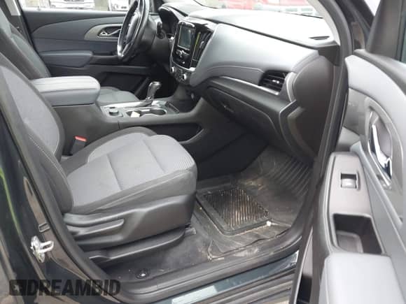 2019 Chevrolet Traverse LT Cloth z VIN 1GNEVMKW7KJ238111, wystawiony jako IAAI lot #43282872 z przebiegiem 122 571 mil mil oraz . Historia ofert i sprzedaży dostępna na DreamBid. Obrazek 5.