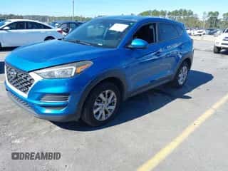 2019 Hyundai Tucson SE z VIN KM8J23A46KU004000, wystawiony jako IAAI lot #43616159 z przebiegiem 130 687 mil mil oraz . Historia ofert i sprzedaży dostępna na DreamBid. Obrazek 2.