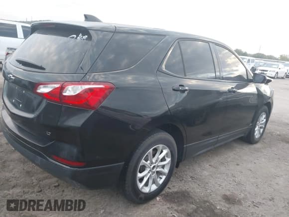 ✅ 2018 Chevrolet Equinox LT • VIN: 2GNAXJEV3J6186031 • Lot: 43453122. Listed on IAAI with 124,392 mi. Free auction sales archive from the USA and detailed vehicle history report at DreamBid. Image 4.