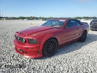 ✅ 2007 Ford Mustang Deluxe • VIN: 1ZVFT84N575272852 • Lot: 80630885. Listed on Copart with 209,632 mi. Free auction sales archive from the USA and detailed vehicle history report at DreamBid. Image 1.