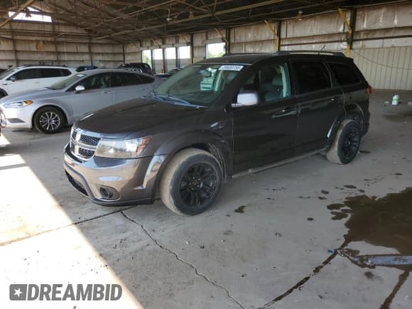 ✅ 2017 Dodge Journey Crossroad Plus • VIN: 3C4PDDGG2HT620148 • Lot: 59600755. Listed on Copart with 127,762 mi. Free auction sales archive from the USA and detailed vehicle history report at DreamBid. Image 1.