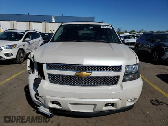 2013 Chevrolet Tahoe LTZ with VIN 1GNSKCE09DR110650, listed as a Copart auction lot 82342915 with 107,934 mi miles and Clean title. Bid and sale history available at DreamBid. Image 5.