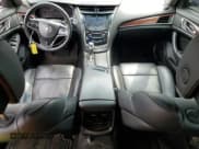 ✅ 2014 Cadillac CTS AWD • VIN: 1G6AW5SX4E0149984 • Lot: 67178085. Listed on Copart with 104,856 mi. Free auction sales archive from the USA and detailed vehicle history report at DreamBid. Image 8.