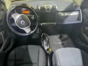 ✅ 2012 Smart fortwo Pure • VIN: WMEEJ3BA5CK540092 • Lot: 94611465. Wystawiony na Copart z przebiegiem 59 356 mil. Bezpłatny archiwum sprzedaży aukcyjnych z USA i szczegółowy raport historii pojazdu na DreamBid. Zdjęcie 9.