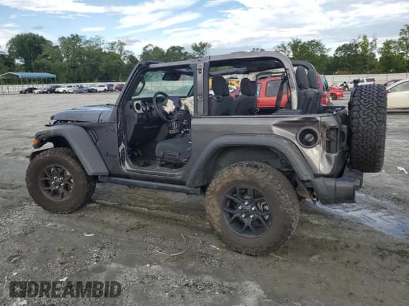 ✅ 2024 Jeep Wrangler Sport • VIN: 1C4PJXAG6RW101005 • Lot: 68813035. Listed on Copart with Not provided. Free auction sales archive from the USA and detailed vehicle history report at DreamBid. Image 2.