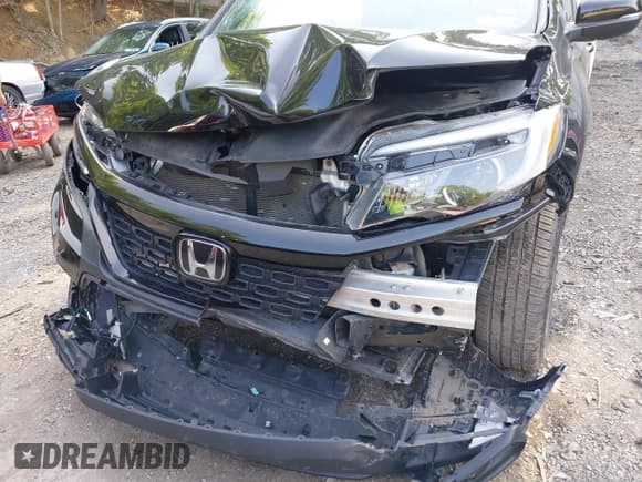 ✅ 2021 Honda Passport EX-L • VIN: 5FNYF8H57MB022083 • Lot: 42399294. Listed on IAAI with 61,014 mi. Free auction sales archive from the USA and detailed vehicle history report at DreamBid. Image 6.