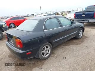 ✅ 2000 Suzuki Esteem GL • VIN: JS2GB41S9Y5182768 • Lot: 41566428. Wystawiony na IAAI z przebiegiem 120 698 mil. Bezpłatny archiwum sprzedaży aukcyjnych z USA i szczegółowy raport historii pojazdu na DreamBid. Zdjęcie 4.