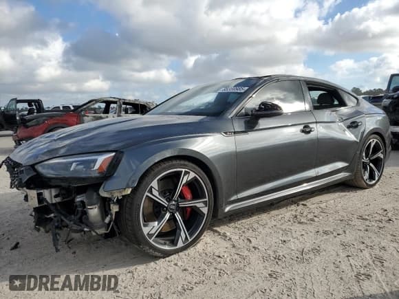 ✅ 2019 Audi RS 5 Sportback • VIN: WUABWCF55KA906835 • Лот: 85359985. Опубликован ранее на Copart с пробегом 52 543 миль. Бесплатный доступ к архиву аукционных продаж из США и подробный отчёт об истории автомобиля на DreamBid. Изображение 1.