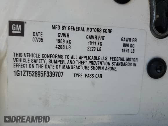 2005 Chevrolet Malibu LS z VIN 1G1ZT52895F339707, wystawiony jako Copart lot #83269814 z przebiegiem 100 709 mil mil oraz Nie do naprawy • Non repairable. Historia ofert i sprzedaży dostępna na DreamBid. Obrazek 13.