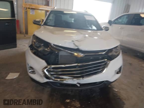 2020 Chevrolet Equinox Premier z VIN 3GNAXYEX3LS534571, wystawiony jako IAAI lot #43458472 z przebiegiem 116 711 mil mil oraz . Historia ofert i sprzedaży dostępna na DreamBid. Obrazek 12.