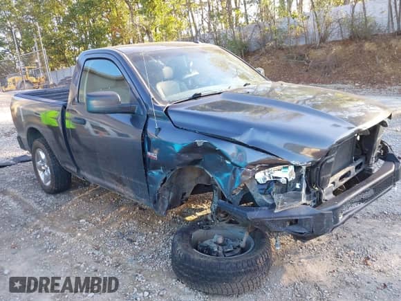 2015 Ram 1500 Express z VIN 3C6JR6AT8FG574458, wystawiony jako IAAI lot #43334806 z przebiegiem 67 164 mil mil oraz . Historia ofert i sprzedaży dostępna na DreamBid. Obrazek 1.